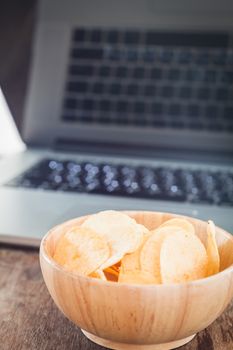 Crispy potato chips on wotk station, stock photo