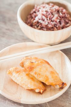 Grilled chicken wings with multi grains berry rice, stock photo