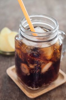 Iced cola with potato chips, stock photo