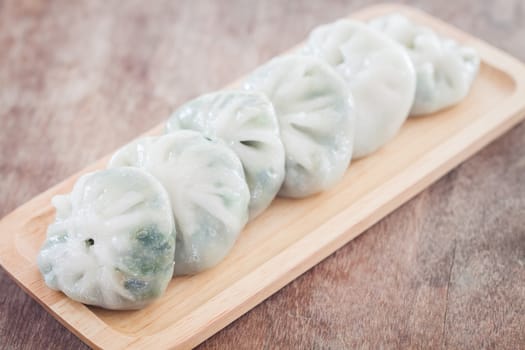 Chinese leek steamed dessert on wooden table, stock photo