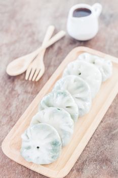 Chinese leek steamed dessert on wooden table, stock photo