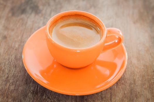 Hot coffee on wooden table, stock photo