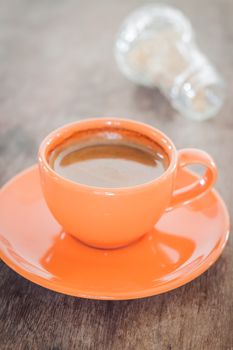 Hot coffee on wooden table, stock photo