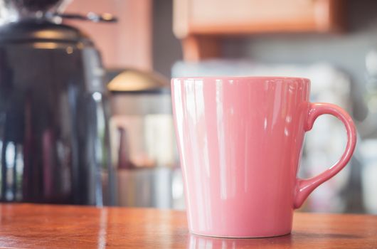 Coffee mug in coffee shop, stock photo