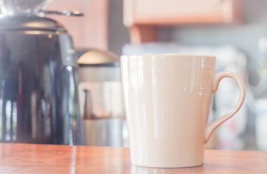 Coffee mug in coffee shop, stock photo