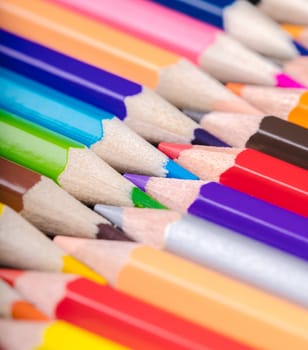 colored pencils close-up while lying in a row
