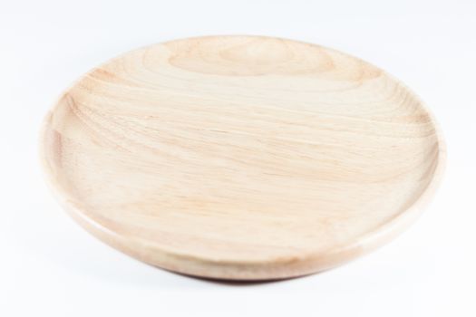 Wooden plate isolated on white background, stock photo