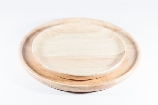 Wooden plate isolated on white background, stock photo