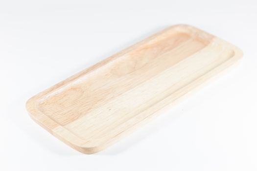 Wooden plate isolated on white background, stock photo