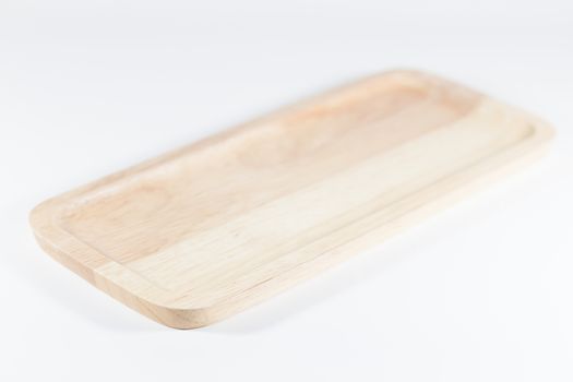 Wooden plate isolated on white background, stock photo
