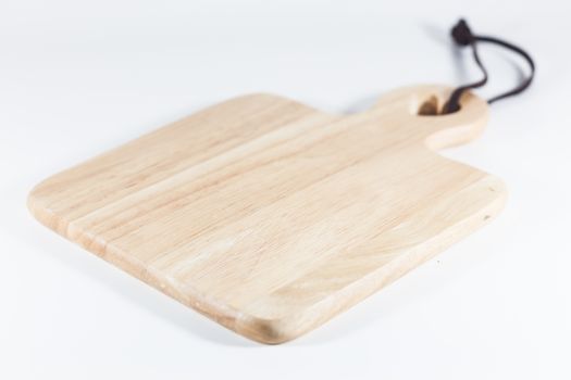 Wooden plate isolated on white background, stock photo