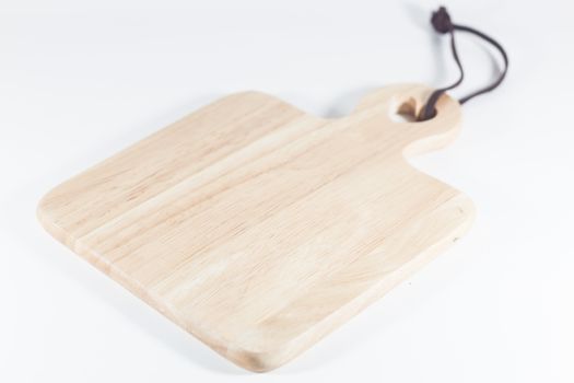 Wooden plate isolated on white background, stock photo