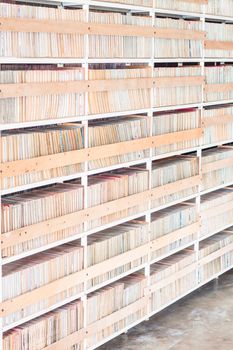 Cartoon books shelf background in book store, stock photo