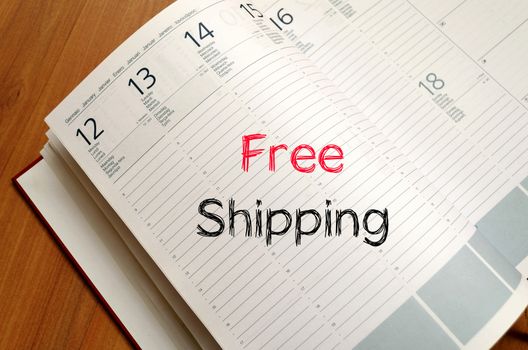 Free shipping text concept write on notebook