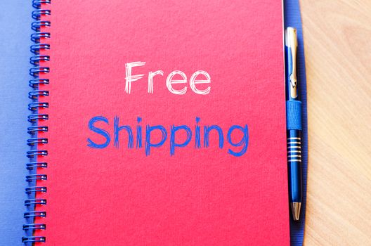 Free shipping text concept write on notebook