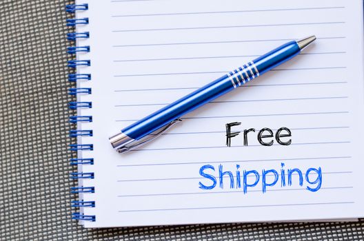 Free shipping text concept write on notebook