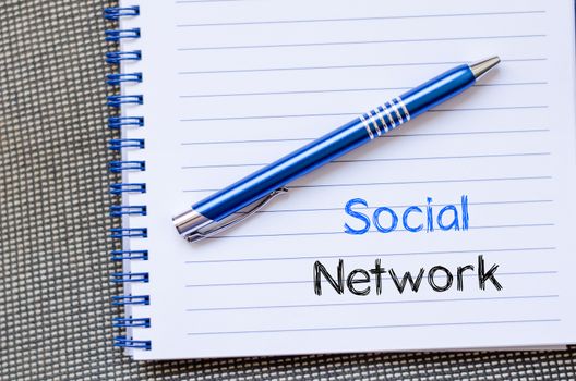 Social network text concept write on notebook