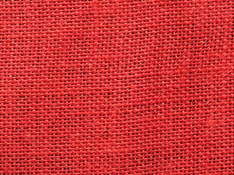 close up of red burlap fabric texture background