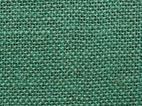 close up of green burlap fabric texture background