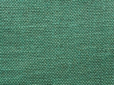 close up of green burlap fabric texture background