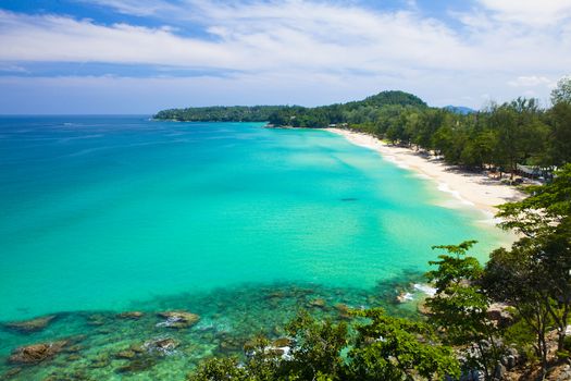 Surin Beach with large boulders in Phuket Thailand