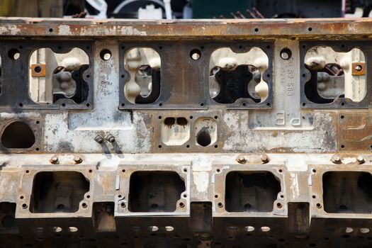 Impressions of the cylinder block of the car with a strong engine size.