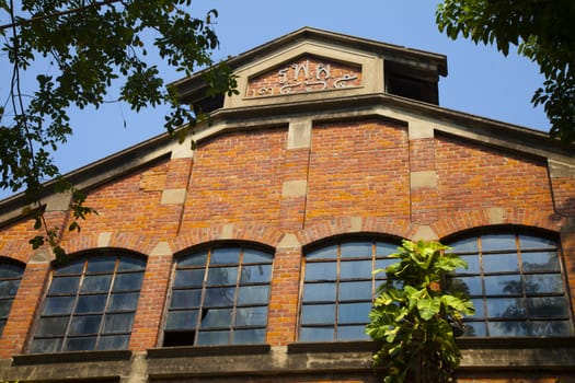 State Railway of Thailand ; SRT Built from bricks, plastered with red-orange.