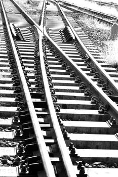 Railroad tracks at a train station Thailand.black and white picture