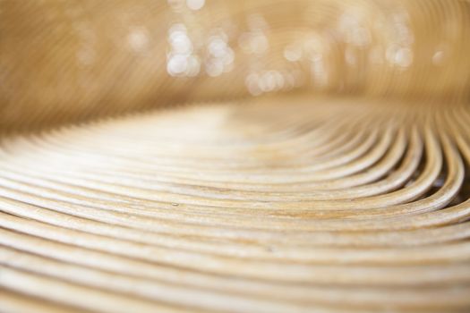 Cane or wickerwork background- showing the details of interlaced weave structure of basket or furniture,Abstract background from natural rattan. Handmade weaving.