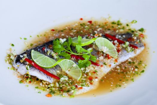 Steamed snapper fish with chili and lemon , spicy cuisine.