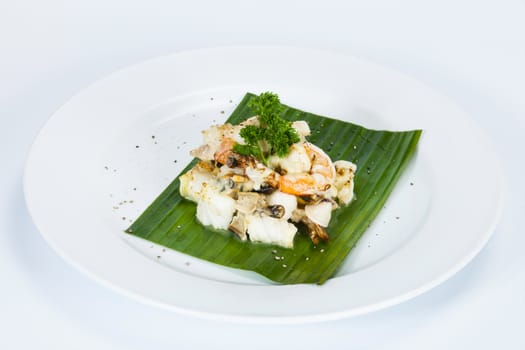 Shrimp fish meat squid shellfish and mushrooms salad dressing,Thai food in a luxury hotel.
