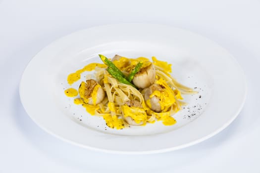 Egg Noodles with scallops;Thai food in a luxury hotel.