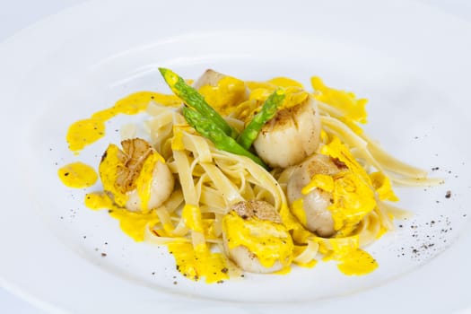 Egg Noodles with scallops;Thai food in a luxury hotel.