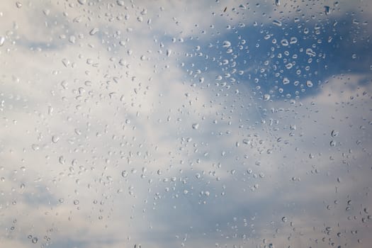 rain drop on the plastic roof with the sun light