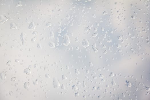 rain drop on the plastic roof with the sun light