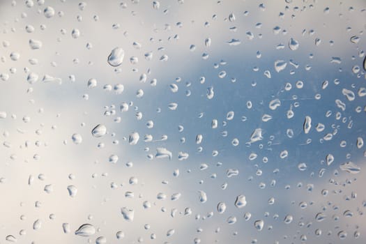rain drop on the plastic roof with the sun light
