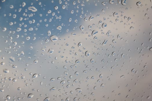 rain drop on the plastic roof with the sun light