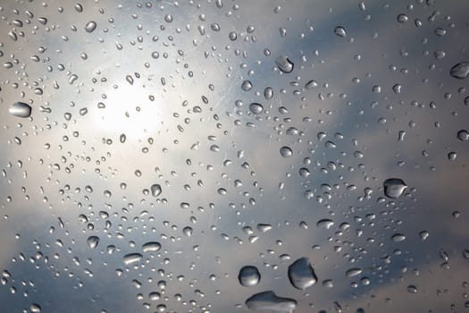 rain drop on the plastic roof with the sun light