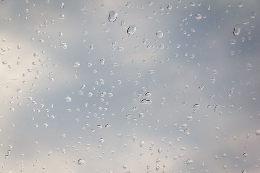 rain drop on the plastic roof with the sun light