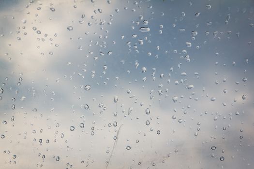 rain drop on the plastic roof with the sun light