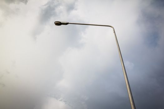the lamp pole with dark clound ,background