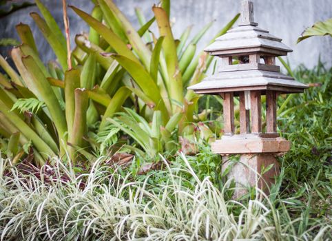 Wooden lamp decorated in garden, stock photo