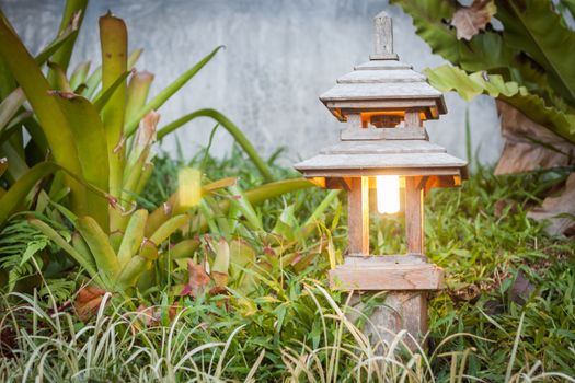 Wooden lamp decorated in garden, stock photo