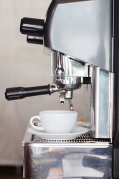 Coffee cup with espresso machine, stock photo