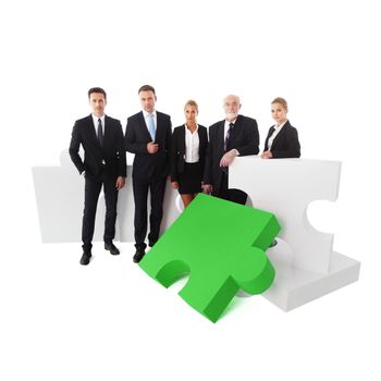 Portrait of business team and puzzle isolated on white background