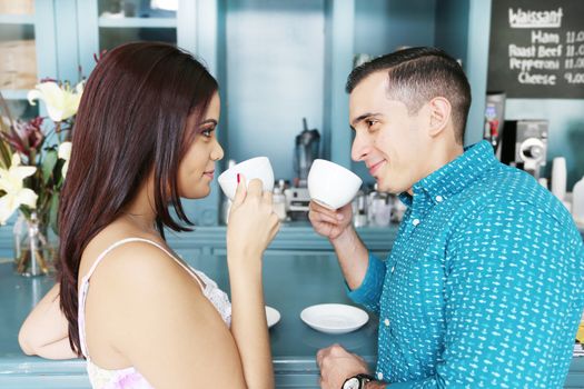 Casual couple having coffee together at the coffee shop