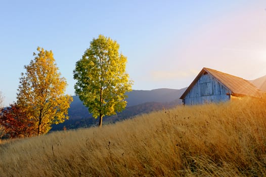 Mountain autumn landscape with houses