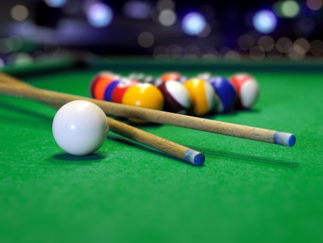 Billiard balls in a green pool table