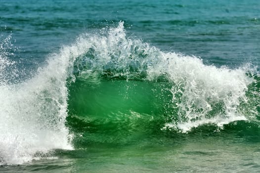 Wave of the ocean on the sand beach
