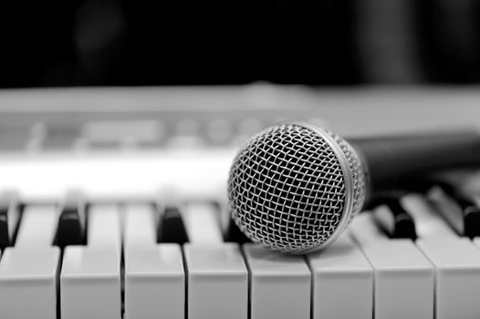Close-up classical microphone on electronic keyboard 